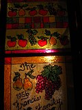 Fake mosaic my mom helped me with to add privacy to the glass pantry door. We copied the large grapes from the wallpaper border.